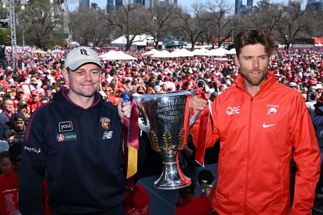 Jubilant AFL fans pack the streets for finals parade