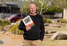 Retired restaurateur Chris Hansen with his new book Chefs Eat Canberra. Picture Jordan Mirchevski