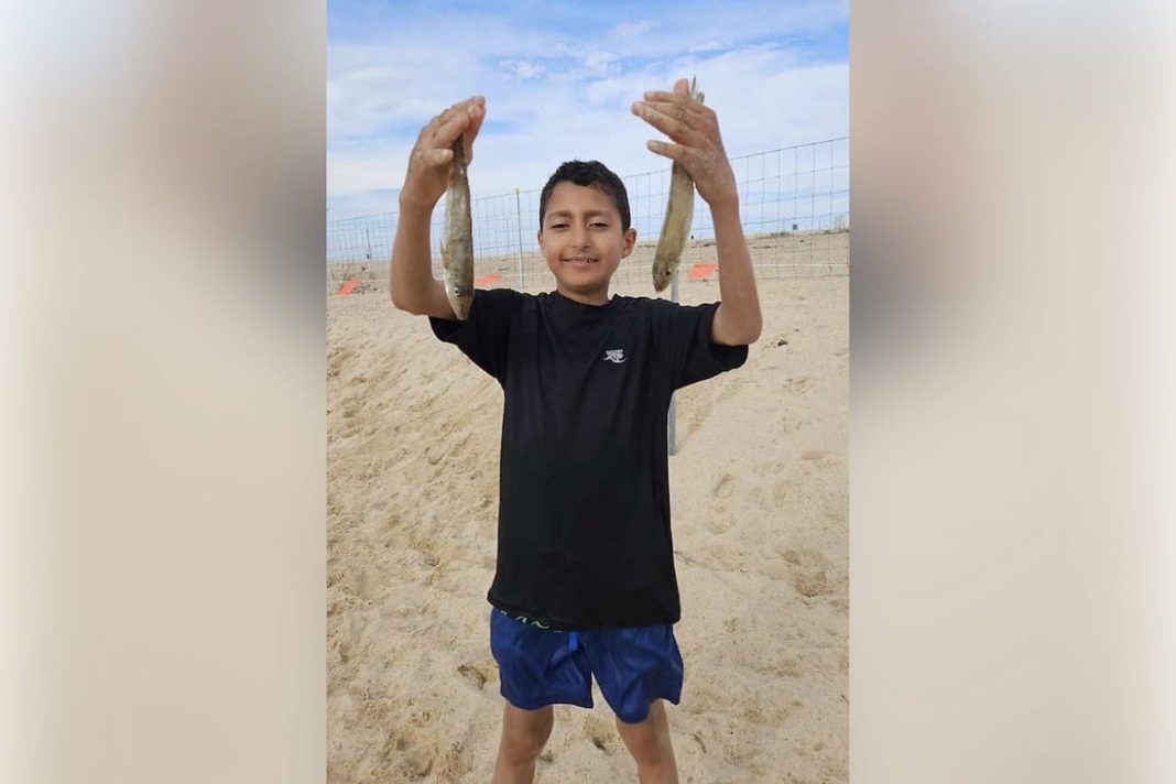 Body found in search for boy swept out to sea