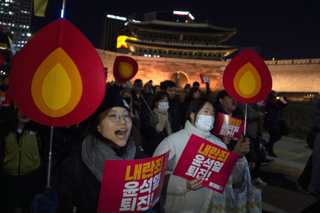 Protesters are calling for the arrest of South Korean President Yoon Suk-yeol. (AP PHOTO)