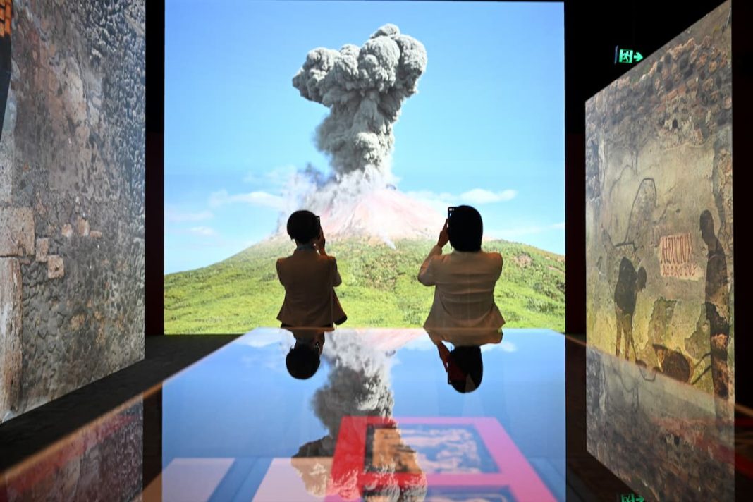 The eruption of Mt Vesuvius is captured in an immersive National Museum of Australia exhibition. (Lukas Coch/AAP PHOTOS)