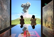 The eruption of Mt Vesuvius is captured in an immersive National Museum of Australia exhibition. (Lukas Coch/AAP PHOTOS)