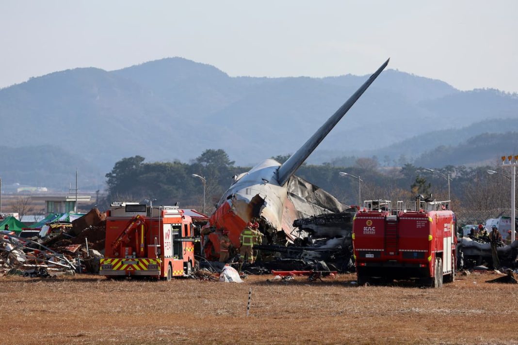 Fire crews and rescue workers rushed to the crash scene at South Korea's Muan International Airport. (AP PHOTO)