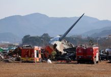 Fire crews and rescue workers rushed to the crash scene at South Korea's Muan International Airport. (AP PHOTO)