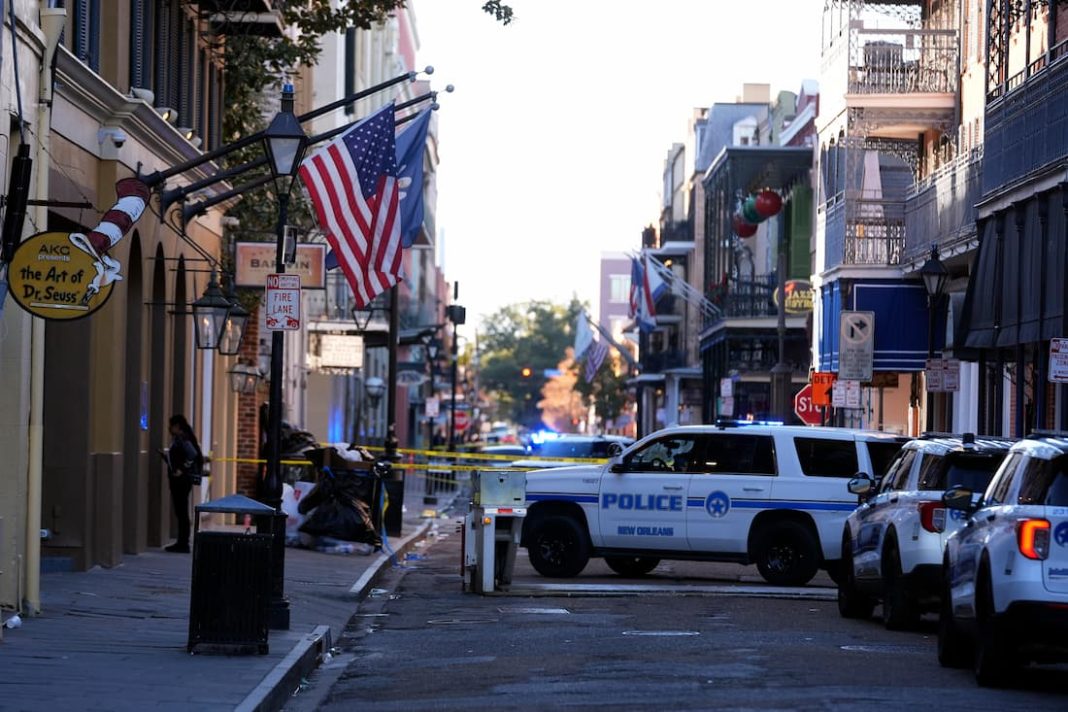 The death toll from a deliberate truck crash in New Orleans has risen to 15, officials say. (AP PHOTO)