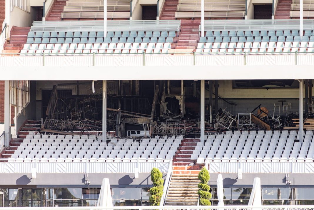 Police are investigating a suspicious fire that has damaged a Caulfield Racecourse grandstand. (Diego Fedele/AAP PHOTOS)