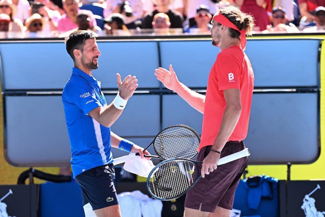 Novak Djokovic (L) quits after losing the first set of his Open semi-final against Alexander Zverev. (James Ross/AAP PHOTOS)