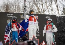 Australian aerial skiers Laura Peel (c) and Airleigh Frigo (r) celebrate podium finishes in Canada. (International Ski Federation (FIS)/AAP PHOTOS)